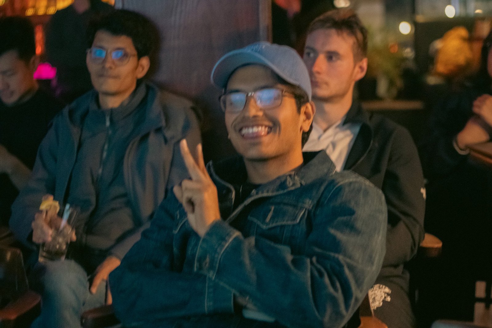 a peace sign from the crowd