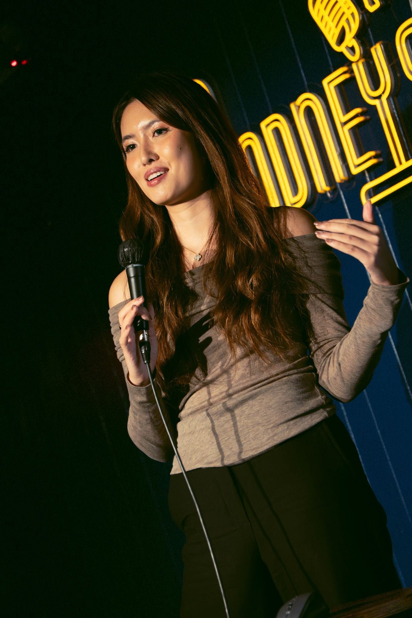 claire zau under the rodneys sign