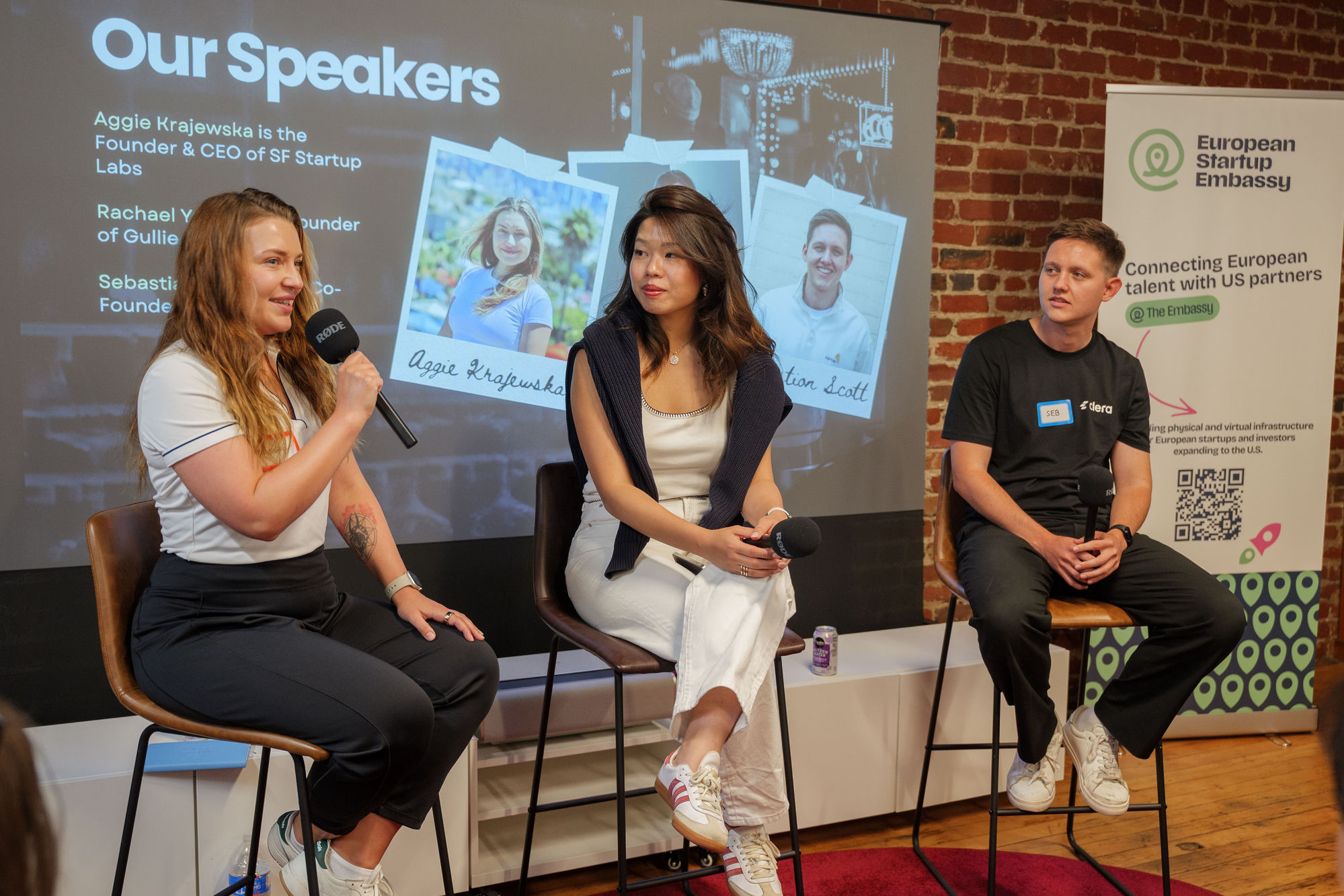 Three founder speakers on stage during a panel at a Founders on Tap event