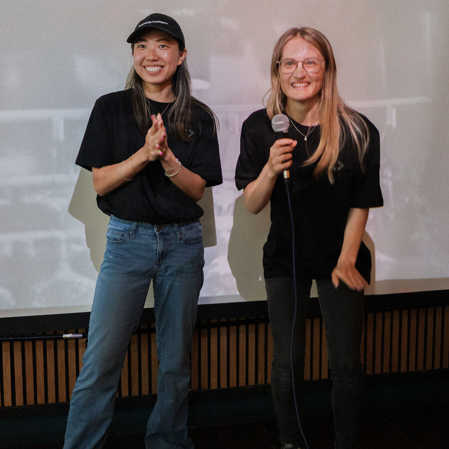 Selina and Lyvia on stage, opening a Founders on Tap night
